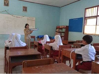 Berlatih Pianika